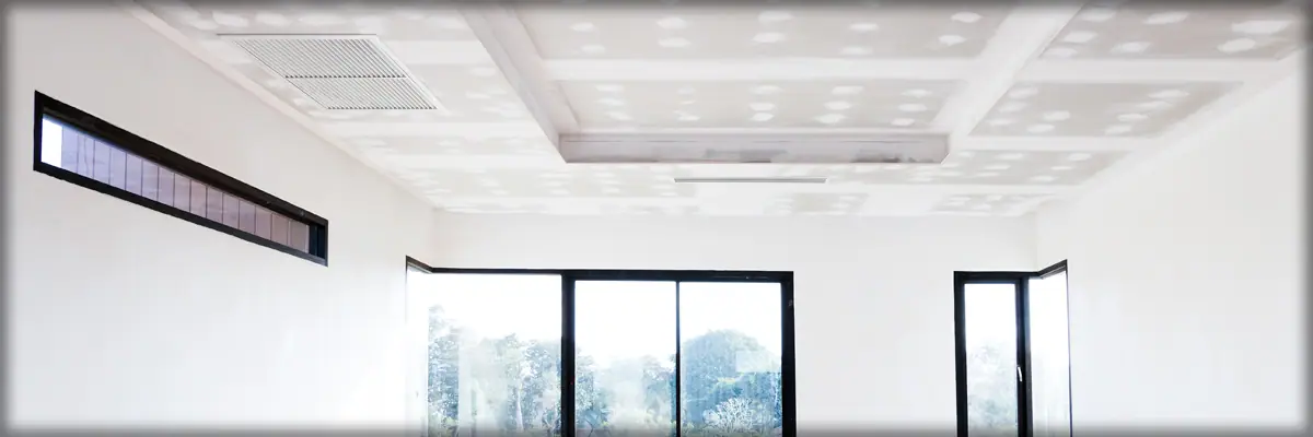 Commercial ceiling system Kelowna — drywall grid and T-bar installation